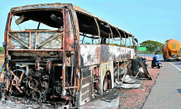 A private travel bus which burned at Tummala Palem near Ibrahimpatnam in Krishna district on Thursday. (Photo: DC) A private travel bus which burned at Tummala Palem near Ibrahimpatnam in Krishna district on Thursday. (Photo: DC)
